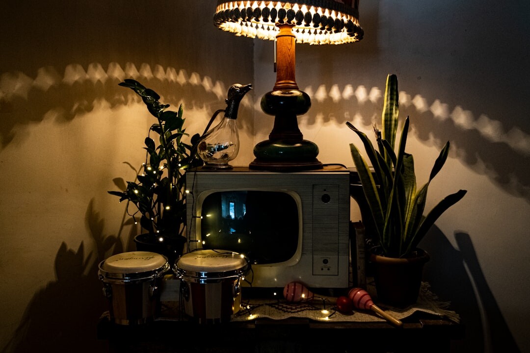 Retro television studio with vintage broadcast cameras and stage lights
