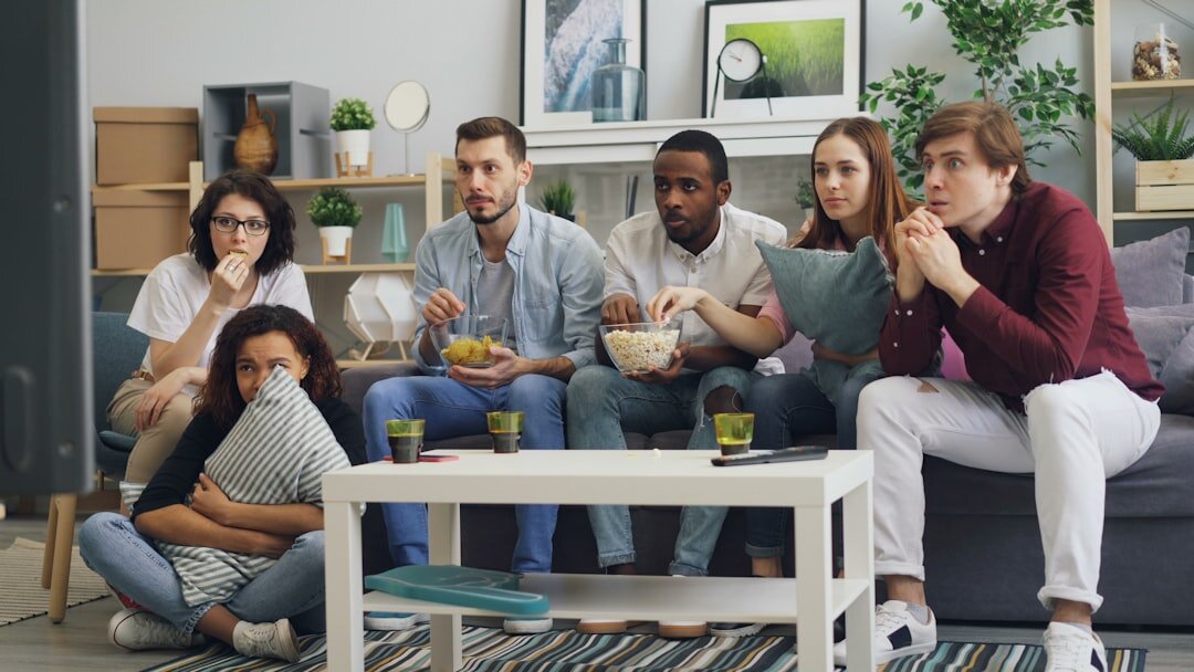 group watching tv